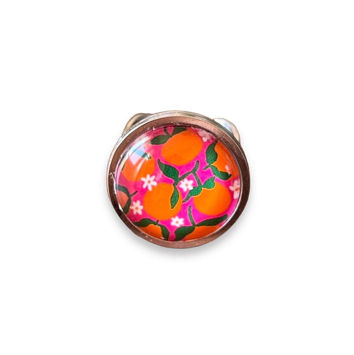 Bague dorée Oranges sur fond rose