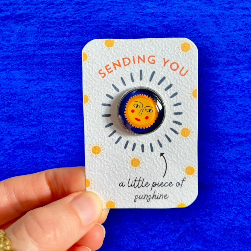 Sun Face pin badge