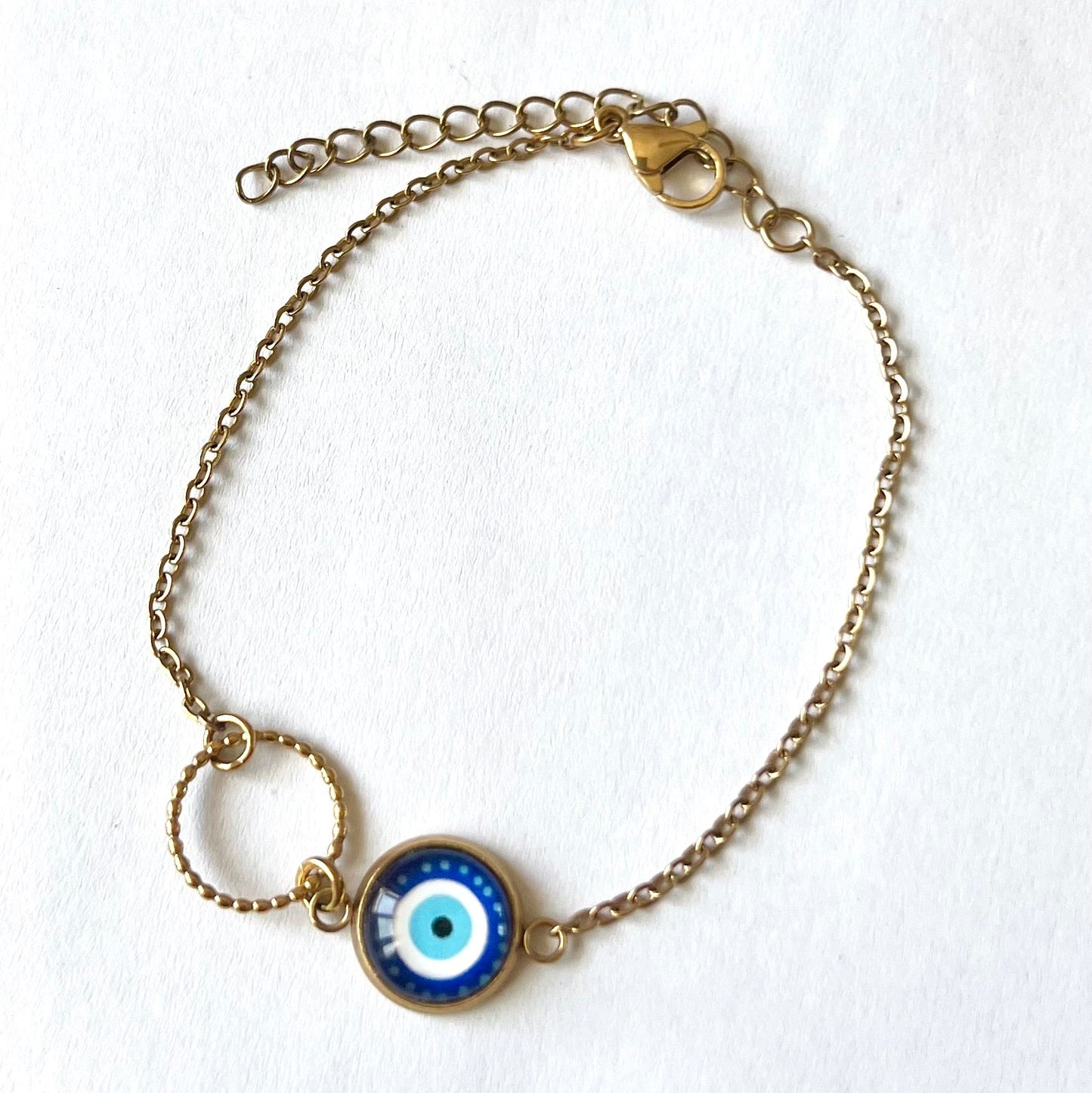 Bracelet oeil protecteur bleu, anneau ciselé, finition dorée ou argentée