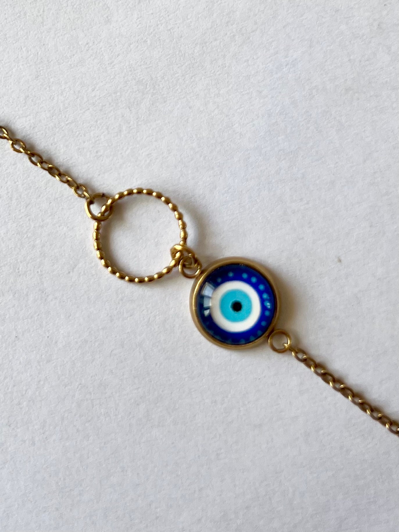 Bracelet oeil protecteur bleu, anneau ciselé, finition dorée ou argentée