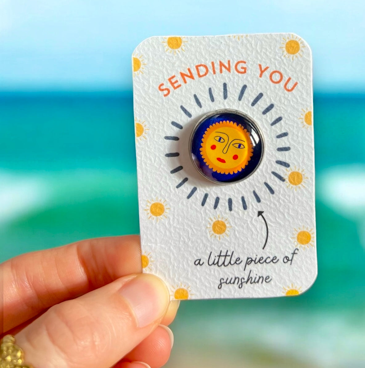 Sun Face pin badge