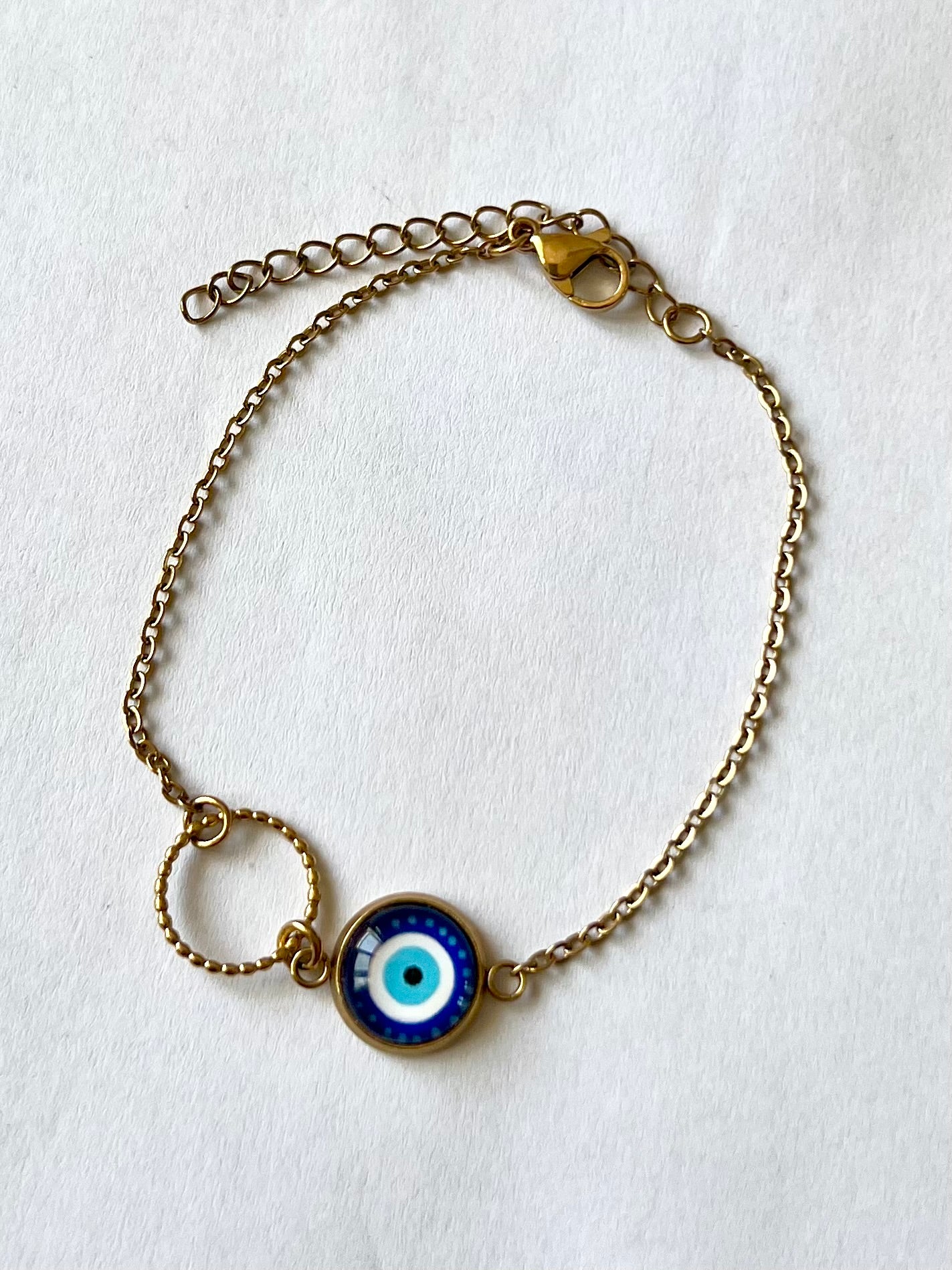 Bracelet oeil protecteur bleu, anneau ciselé, finition dorée ou argentée