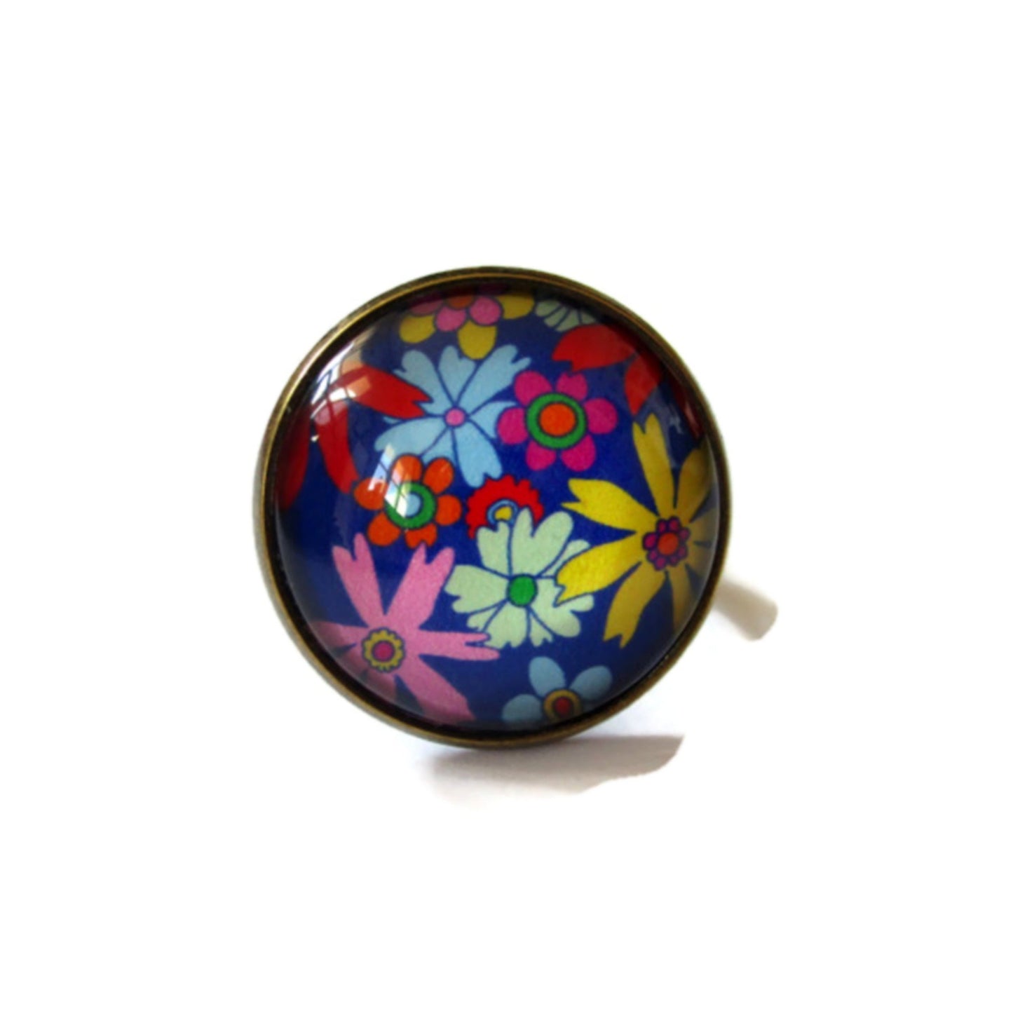 Bague Fleurs multicolores seventies sur fond bleu