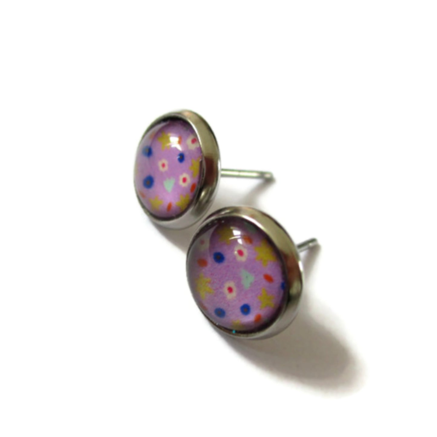 Puces d'Oreilles Enfant Fleurs multicolores sur fond violet