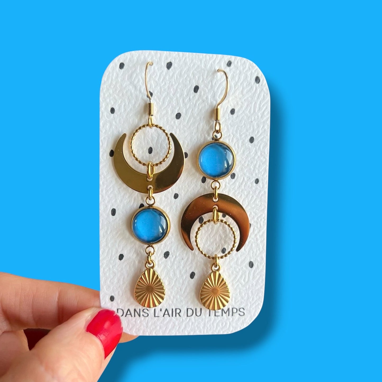Boucles d'oreilles asymétriques lunes bleues