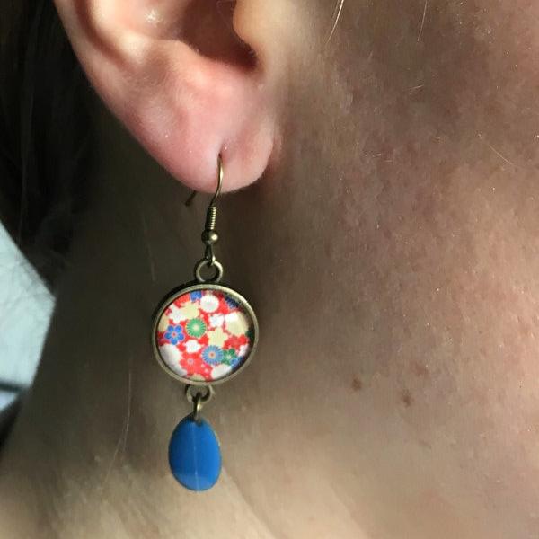 Red sakura earrings and blue enamel