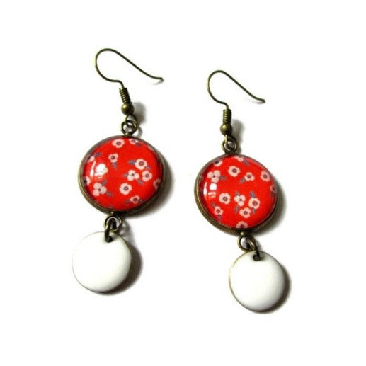 Red and white floral earrings and white enamel