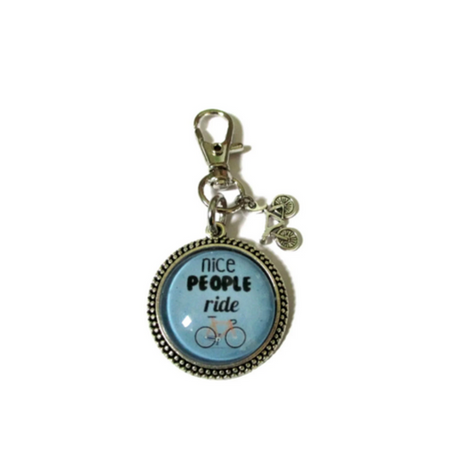 Nice people ride bicycle keychain for child