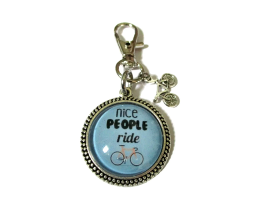 Nice people ride bicycle keychain for child